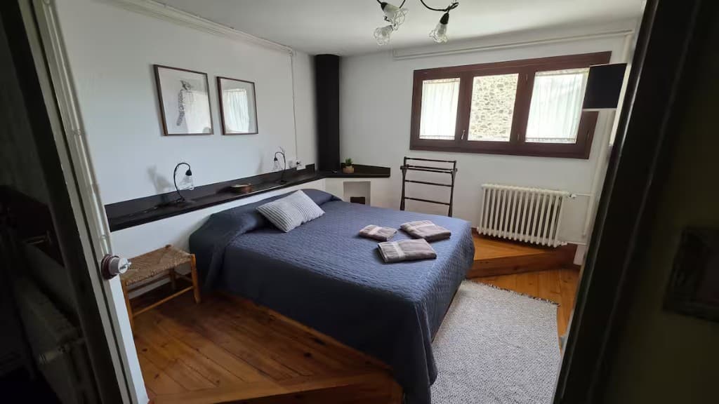 Attic bedroom with double and single beds