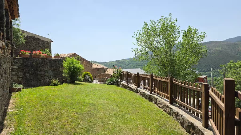 Garden lawn overlooking the village and hills